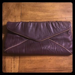 BCBG purple leather envelope clutch with chain